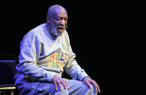 FILE - In this Nov. 21, 2014 file photo, Bill Cosby performs during a show at the Maxwell C. King Center for the Performing Arts in Melbourne, Fla. The scandal-plagued comedaian returns to the stage Wednesday, Jan. 7, 2015 for the first time since November with some planning protests, others vowing not to show up and others still saying they will heckle the comedian in Canada. (AP Photo/Phelan M. Ebenhack, File)