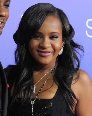 FILE - In this Aug. 16, 2012, file photo, Bobbi Kristina Brown attends the Los Angeles premiere of "Sparkle" at Grauman's Chinese Theatre in Los Angeles. Messages of support were being offered Monday, Feb. 2, 2015, as people awaited word on Brown, who authorities say was found face down and unresponsive in a bathtub over the weekend in a suburban Atlanta home. (Photo by Jordan Strauss/Invision/AP, File)