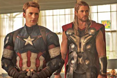 IN COSTUME, the two Chrises as Captain America (left) and Thor