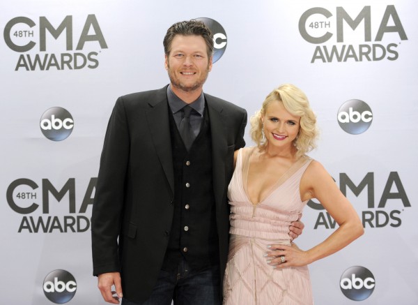 In this Nov. 5, 2014, file photo, Blake Shelton, left, and Miranda Lambert arrive at the 48th annual CMA Awards in Nashville, Tennessee. Shelton and Lambert announced their divorce after four years of marriage. Shelton’s spokesman provided a statement from the couple on Monday, July 20, 2015.  PHOTO BY EVAN AGOSTINI/INVISION/AP  