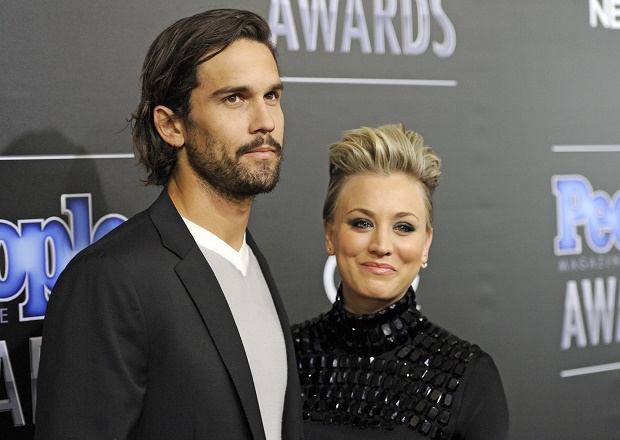 FILE - In this Dec. 18, 2014 file photo, Ryan Sweeting, left, and his wife Kaley Cuoco arrive at the People Magazine Awards at the Beverly Hilton in Beverly Hills, Calif. Cuoco, the star of "The Big Bang Theory," is divorcing Sweeting after less than two years of marriage. Cuoco's representative, Melissa Kates, said Saturday, Sept. 26, 2015 that the actress and the tennis pro have "mutually decided to end their marriage." The couple wed in a New Year's Eve ceremony in 2013. (Photo by Chris Pizzello/Invision/AP, File)