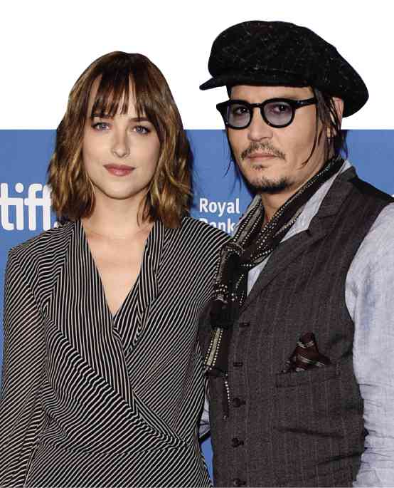 JOHNSON with Johnny Depp . AFP