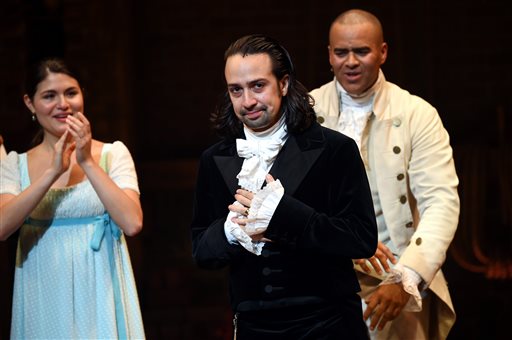 Actor and "Hamilton" creator Lin-Manuel Miranda, center, takes his final performance curtain call at the Richard Rogers Theatre on Saturday, July 9, 2016, in New York. (Photo by Evan Agostini/Invision/AP)