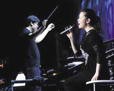 THE AUTHOR is proud of her brother, assistant conductor of Hong Kong Philharmonic.       Joel H. Garcia/contributor