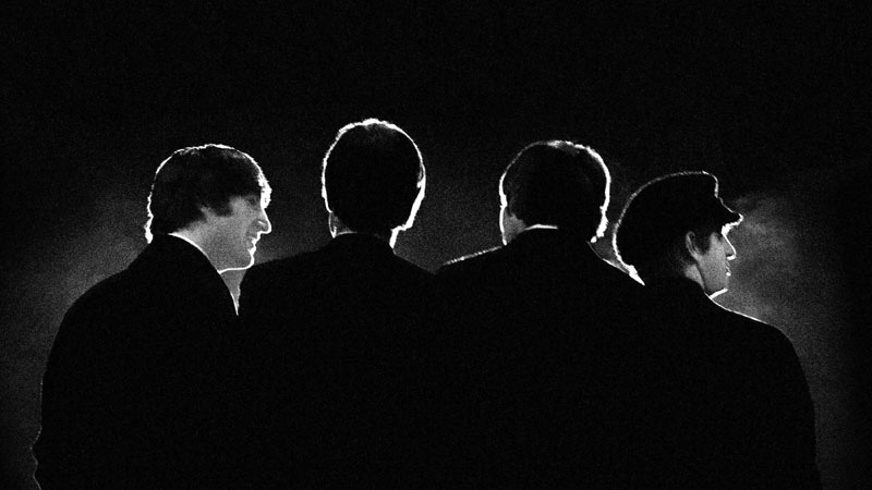 FAB FOUR’S FIRST This file photo of February 11, 1964, provided by Christie's auction house from a collection of photos of The Beatles shot by photographer Mike Mitchell, shows the group during their first U.S. concert, at the Washington Coliseum in Washington, D.C. On Wednesday, July 20, 2011, Christie's auction house will sell the collection of 50 silver gelatin prints Mitchell took when he was 18 during the group's first U.S. concert in Washington D.C. in 1964. The images, plus photos from another Beatles' concert, are estimated to fetch a total of $100,000. AP
