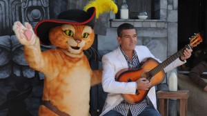 FELINE POWER. In this Oct. 22, 2011 file photo, Antonio Banderas arrives at the premiere of "Puss In Boots," at The Regency Village Theater in Los Angeles. “Puss in Boots” landed on all fours, opening with an estimated $34 million to lead the box office. The PG-rated movie scored with family audiences on the weekend before Halloween, and also drew a large Hispanic crowd which made up 35 percent of its audience. AP Photo/Katy Winn, File