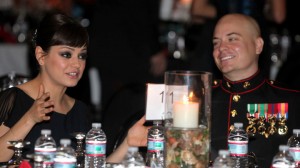Sgt. Scott Moore and his guest, actress Mila Kunis are seen at the 236th Marine Corps birthday ball for 3rd Battalion, 2nd Marine Regiment, 2nd Marine Division in Greenville, N.C. AP