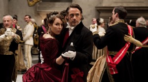 In this film image released by Warner Bros. Pictures, Noomi Rapace, left, and Robert Downey Jr. are shown in a scene from "Sherlock Holmes: A Game of Shadows." AP PHOTO/WARNER BROS. PICTURES
