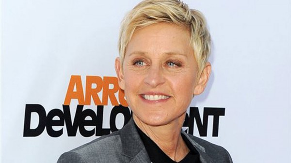 In this April 29, 2013 file photo, TV host Ellen DeGeneres arrives at the season 4 premiere of "Arrested Development" in Los Angeles. Producers announced Friday, Aug. 2, that DeGeneres will return to host the Oscars on March 2, 2014. AP