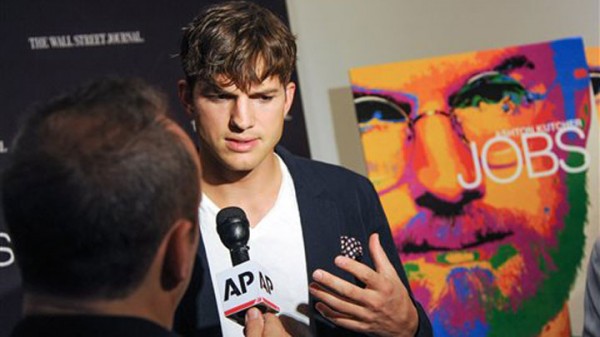Actor Ashton Kutcher is interviewed as he attends a special screening of "JOBS" hosted by The Wall Street Journal at the Museum of Modern Art on Wednesday, Aug. 7, 2013, in New York. AP