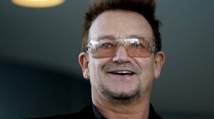 Irish singer Bono waits for the beginning of a reception with German Chancellor Angela Merkel and ambassadors of the ONE Foundation against poverty in Berlin, Germany. AP
