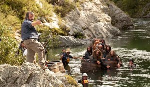 This image released by Warner Bros. Pictures shows director Peter Jackson, left, during the filming of "The Hobbit: The Desolation of Smaug." (AP Photo/Warner Bros. Pictures, James Fisher)
