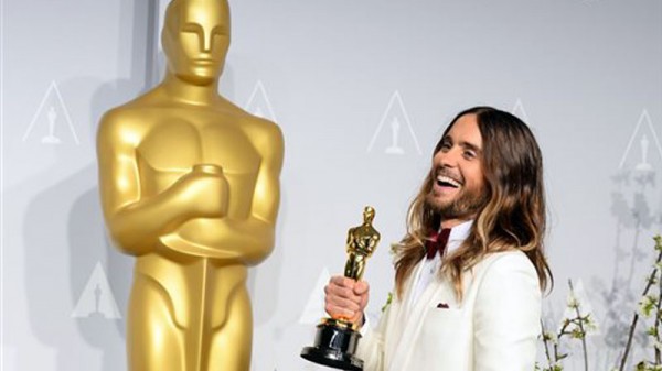 In this March 2, 2014 file photo, Jared Leto poses in the press room with the award for best actor in a supporting role for "Dallas Buyers Club" during the Oscars at the Dolby Theatre in Los Angeles. Leto is now promoting “Artifact,” a documentary he directed about his band 30 Seconds to Mars’ battle with its record label over its contract and a $30 million lawsuit. The film, available now on iTunes, airs April 26, 2014 on VH1 and Palladia. AP