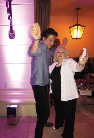 THE ACTOR dances with grandma at the HFPA/InStyle party at the Toronto fest.  photo by Ruben V. Nepales 