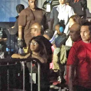 A LOYAL fan snapped this photo of Mariah’s two kids watching the show Tuesday night, surrounded by burly guards.     photo: Jayce Perlas