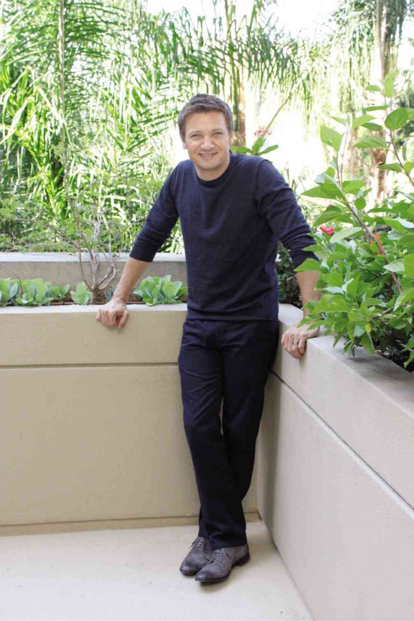 RENNER, left, was in a light mood throughout this interview. 