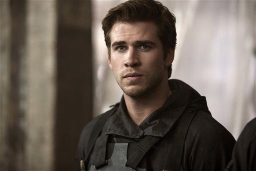 In this image released by Lionsgate, Liam Hemsworth portrays Gale Hawthorne in a scene from "The Hunger Games: Mockingjay Part 1." AP