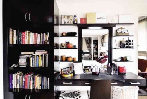 Bookshelf beside vanity dresser in the master bedroom.