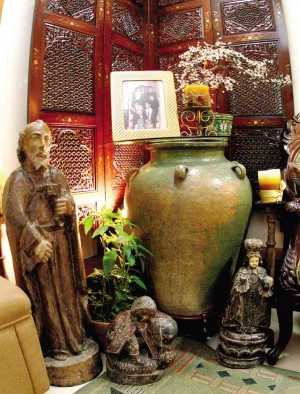 Antiques, including centuries-old burial jar, were from Pete’s mother.