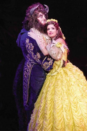 DARICK Pead (left) and Hilary Maiberger as the Beast and Belle 