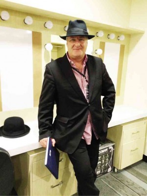 CUNDALL—producer, former banker—tries on another hat in one of 12 dressing rooms. Photo by EMMIE G. VELARDE