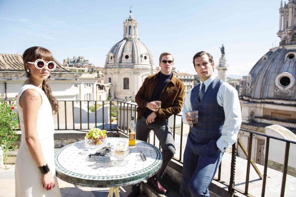 “The Man from U.N.C.L.E.” stars (from left) Alicia Vikander, Armie Hammer and Henry Cavill.
