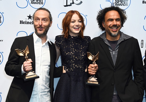 Emmanuel Lubezki, from left, Emma Stone, and Alejandro Gonzalez Inarritu pose in the press room with the award for best feature for “Birdman” or (The Unexpected Virtue of Ignorance) at the 30th Film Independent Spirit Awards on Saturday, Feb. 21, 2015, in Santa Monica, Calif. (Photo by Jordan Strauss/Invision/AP)