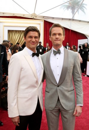 David Burtka, left, and Neil Patrick Harris arrive at the Oscars on Sunday, Feb. 22, 2015, at the Dolby Theatre in Los Angeles. (Photo by Matt Sayles/Invision/AP)