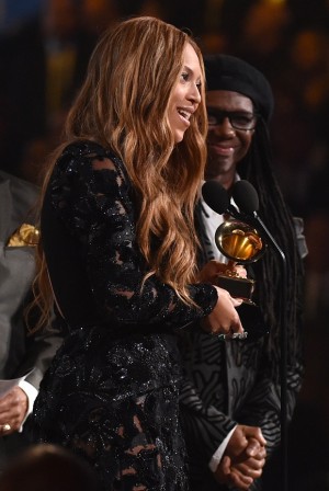 Beyonce accepts the award for best R&B performance for Drunk in Love at the 57th annual Grammy Awards on Sunday, Feb. 8, 2015, in Los Angeles. (Photo by John Shearer/Invision/AP)