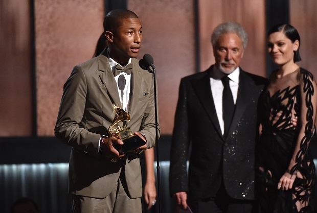 Pharrell Williams accepts the award for best pop solo performance for “Happy” at the 57th annual Grammy Awards on Sunday, Feb. 8, 2015, in Los Angeles. (Photo by John Shearer/Invision/AP)