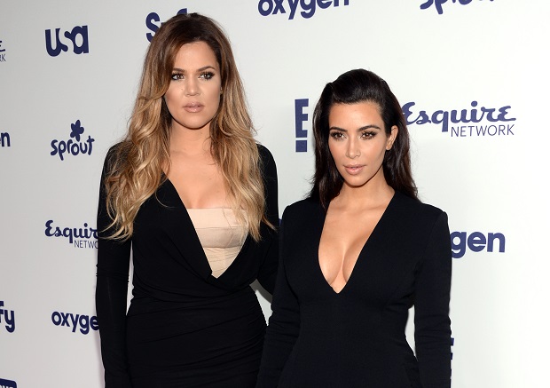 FILE - In this May 15, 2014 file photo, Khloe Kardashian, left, and Kim Kardashian arrive at the NBCUniversal Cable Entertainment 2014 Upfront at the Javits Center in New York. Khloe and Kim Kardashian are safe after the vehicle they were in slid off a Montana road and into a ditch on Saturday, Feb. 21, 2015.  Montana Highway Patrol Capt. Mark Wilfore said the accident occurred before noon on a highway between Bozeman and Belgrade, where the Bozeman Yellowstone International Airport is located. Wilfore said he did not know their destination. (Photo by Evan Agostini/Invision/AP, File)