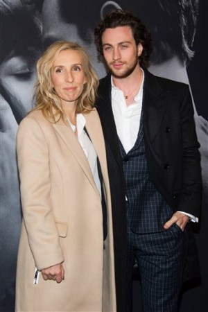 In this Feb. 6, 2015 file photo, director Sam Taylor-Johnson, left, and Aaron Taylor-Johnson attend a special fan screening of "Fifty Shades of Grey" hosted by The Today Show at the Ziegfeld Theatre, in New York. Sam Taylor-Johnson will not be returning to direct the sequels to “Fifty Shades of Grey,” she announced Wednesday night, March 25, 2015. AP