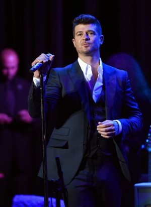  In this Thursday, Feb. 5, 2015 file photo, singer Robin Thicke performs at the 17th Annual Grammy Foundation Legacy Concert at the Wilshire Ebell Theatre in Los Angeles. AP 