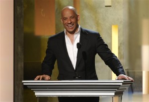 FILE - In this Feb. 22, 2015 file photo, Vin Diesel speaks on stage at the 45th NAACP Image Awards at the Pasadena Civic Auditorium in Pasadena, Calif. Vin Diesel, who announced Monday, March 23, 2015, on the Today Show that he named his newborn daughter Pauline in honor of his late friend and longtime co-star Paul Walker, revealed that some old advice from Walker had been top of mind in the moment. Vin Diesel, and Walker, co-starred in the “Fast & Furious" franchise. (Photo by Chris Pizzello/Invision/AP, File)