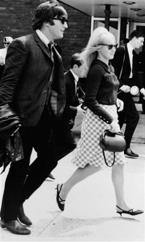 In this July 2,1964 file photo, singer John Lennon and his then wife, Cynthia, at Luton airport after 'The Beatles' arrived home from their three-week tour of Australia and New Zealand. AP