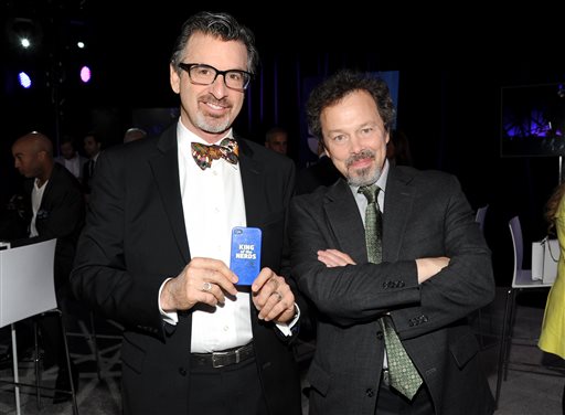 In this May 15, 2013 file photo, "King of the Nerds" co-hosts Robert Carradine, left, and Curtis Armstrong attend the TNT and TBS 2013 Upfront at the Hammerstein Ballroom, in New York. AP