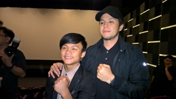 Director Paul Soriano and actor Buboy Villar pose before the fans during the premiere night of the film "Kid Kulafu", held at Power Plant Mall in Makati City. ARVIN MENDOZA