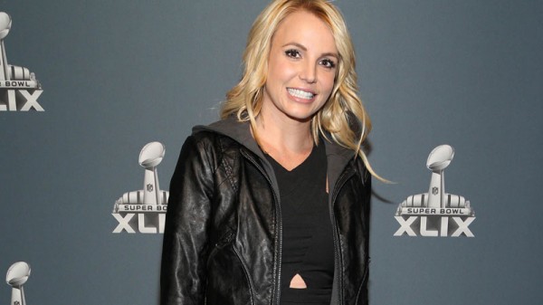 In this Feb. 1, 2015 file photo, Britney Spears arrives at the Super Bowl XLIX red carpet in Glendale, Ariz. An on-stage ankle injury has pop star Spears rescheduling her Friday and Saturday night, May 1 and 2, 2015, performances on the Las Vegas Strip so she doesn’t, oops, do it again. A statement from the Planet Hollywood Resort & Casino where Spears performs her “Britney: Piece of Me” show said Thursday, April 30, 2015, the star’s doctor recommended she take the two days to heal. (Photo by Omar Vega/Invision/AP, File)