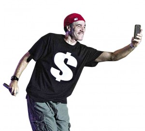 DJ CASH Money took a selfie onstage.