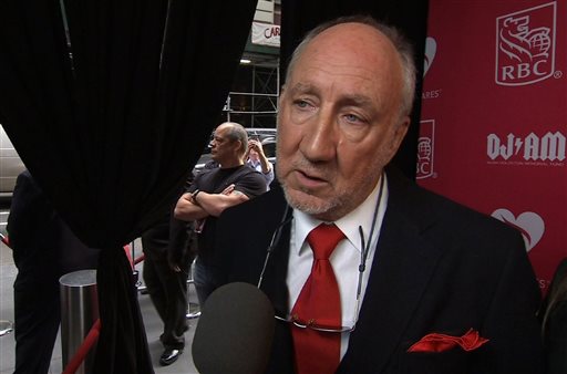 In this image made from APTN video, Pete Townshend arrives at Musicares event in New York, Thursday, May 28, 2015. AP