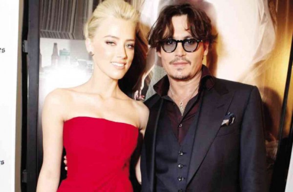 ACTRESS turns coy when talk turns to her husband Johnny Depp. AP photo 