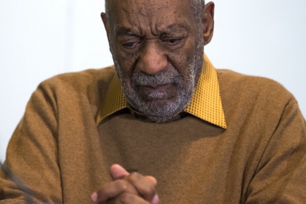 FILE- In this Nov. 6, 2014, file photo, entertainer Bill Cosby pauses during a news conference about the upcoming exhibit at the Smithsonian's National Museum of African Art in Washington. Cosby detailed his efforts to keep his exploits from his wife in a transcript of a 2005-06 deposition taken in Philadelphia. It is the only publicly available testimony he has given in response to accusations he drugged and sexually assaulted dozens of women over four decades. Cosby has denied the allegations, calling the sexual contact consensual. (AP Photo/Evan Vucci, File)