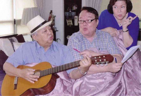 TRILLING THREESOME   Senior couple King Rodrigo (with guitar) and actress Boots Anson-Rodrigo make beautiful music together, or so writes Inquirer columnist Nestor Torre (center) who joins the couple in a song during an interview on the first anniversary of the senior couple. 