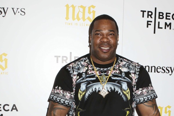 FILE- In this Sept. 30, 2014, file photo, rapper Busta Rhymes attends the premiere of "Nas: Time Is Illmatic" at the Museum of Modern Art in New York. Rhymes was arrested Wednesday, Aug. 5, 2015, following a dispute at a gym in New York. (Photo by Greg Allen/Invision/AP, File)