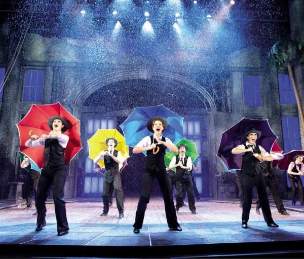 CAST members of “Singin’ in the Rain” perform spiritedly under gallons of recycled water. They are required to be proficient in at least four different dance styles.
