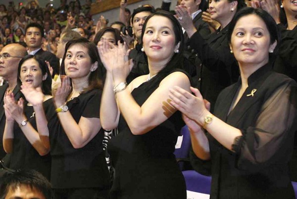 THE AQUINO sisters (from left) Viel, Pinky, Kris and Ballsy: Helping should not be confused with interfering. Edwin Bacasmas