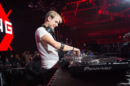 In this Dec. 29, 2014 file photo, Armin van Buuren performs at Pier 94 in New York. Intel Security announced Tuesday that the musicians top its ninth annual list of the most dangerous celebrities online. Searches for those famous names are most likely to land users on websites that carry viruses or malware. The company used its own site ratings to compile the celebrity list. (Photo by Scott Roth/Invision/AP, File)