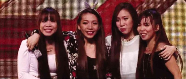 TEARY-EYED sisters (from left) Mylene, Irene, Celina and Almera Cercado get praises from all four “X Factor” judges after their number.  SCREENGRAB 
