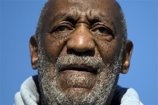 In this Nov. 11, 2014, file photo, comedian and Navy veteran Bill Cosby speaks during a Veterans Day ceremony in Philadelphia. Brown University President Christina H. Paxson says the university's board Friday, Sept. 25, 2015, revoked the doctorate of humane letters it granted Cosby in 1985. AP FILE PHOTO