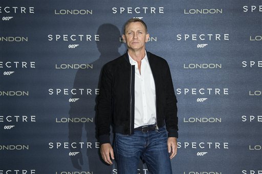 Daniel Craig poses for photographers during the photo call for the latest Bond film, Spectre, at an hotel in central London, Thursday, Oct. 22, 2015. (Photo by Joel Ryan/Invision/AP)